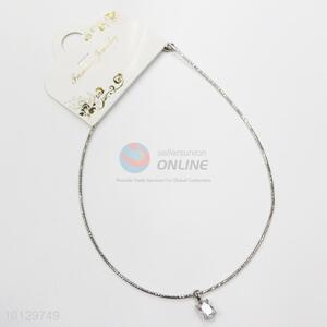 Shiny faced clear stoned charm necklace