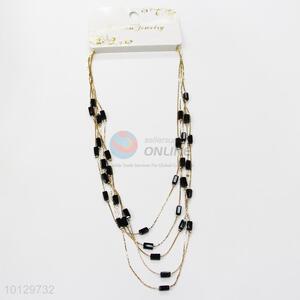 Black faced rectangle stoned gold thin chain necklace