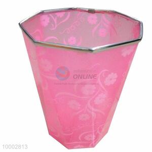 Pink plastic trash can