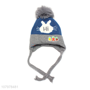 Hot selling children winter fleece lined jacquard earmuff hat with pom pom