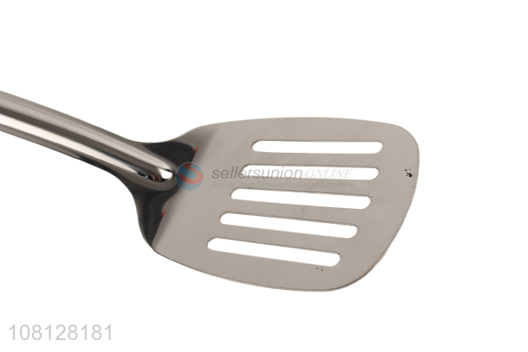 Good quality stainless steel slotted spatula with wooden handle