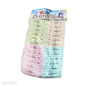 Wholesale 24 pieces colorful plastic clothes pegs laundry products