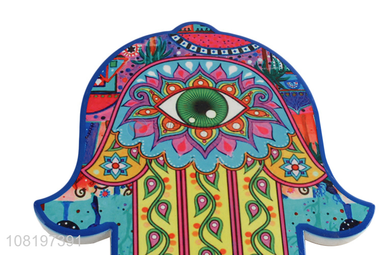 Hot selling hamsa hand ceramic heat insulation mat with cork bottom