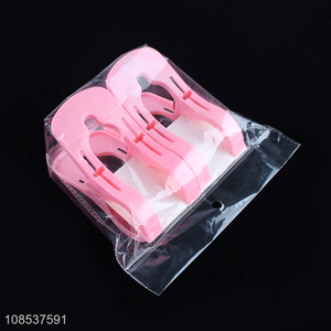 Yiwu market pink clothes pegs quilt clips for household