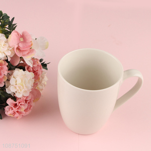 Top selling white <em>ceramic</em> water <em>cup</em> water mug with handle
