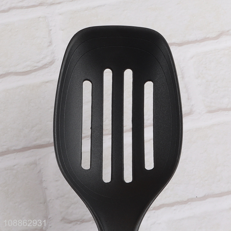 Factory price heat resistant nylon slotted spoon with wooden handle