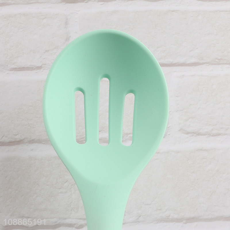 Factory supply slotted silicone cooking spoon with stainless steel handle