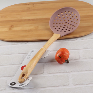China imports heat resistant silicone cooking skimmer with wooden handle