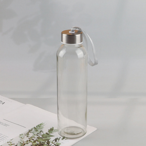 Factory price transparent portable glass water bottle with leakproof lid