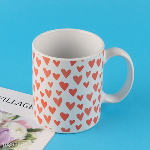 Popular products heart pattern ceramic water cup with handle