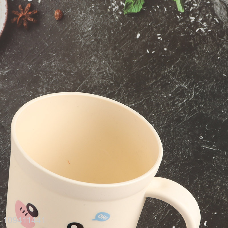 Top selling cute cartoon plastic cup with handle