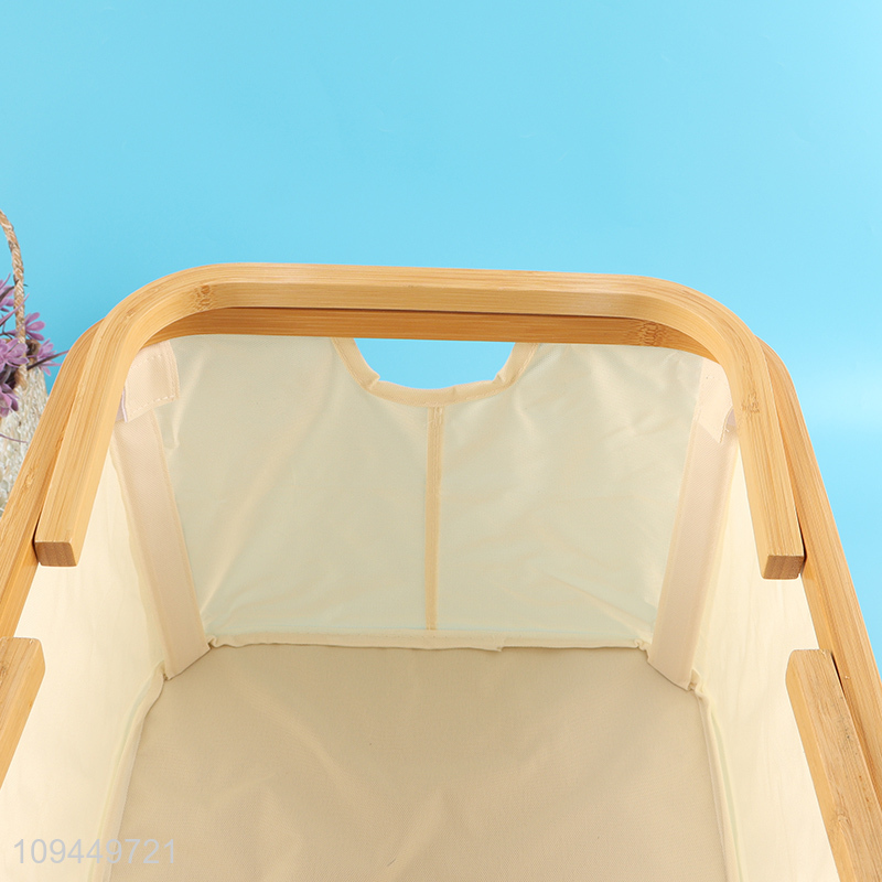 Hot sale polyester storage basket with bamboo handle