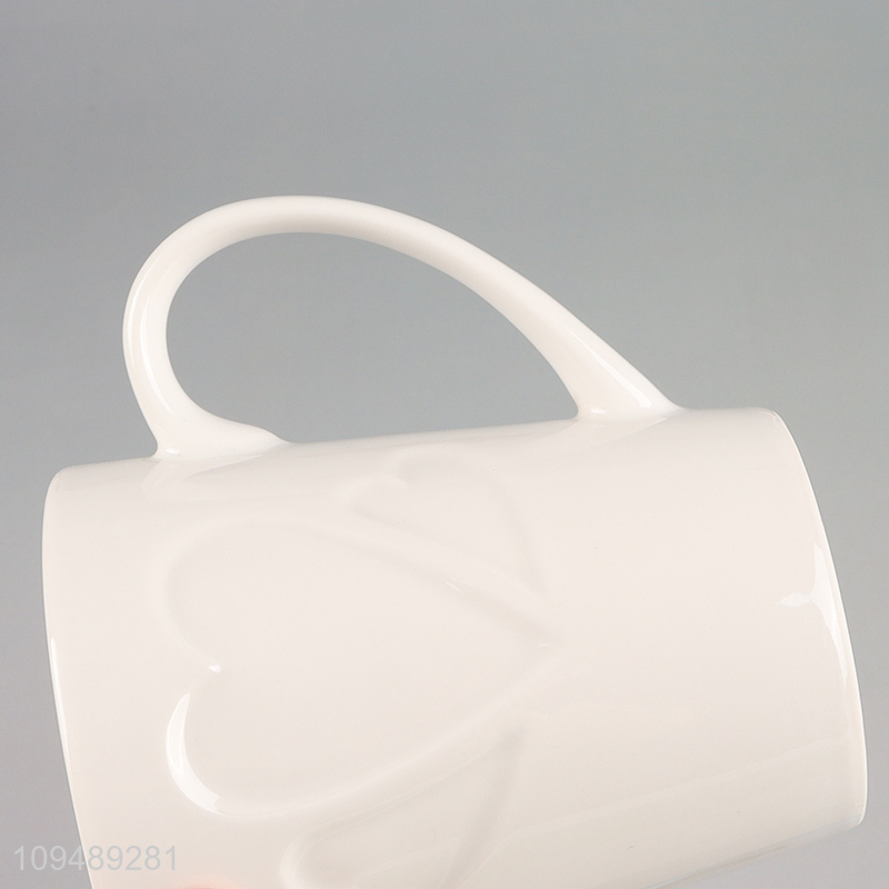 Online wholesale white ceramic water cup with handle